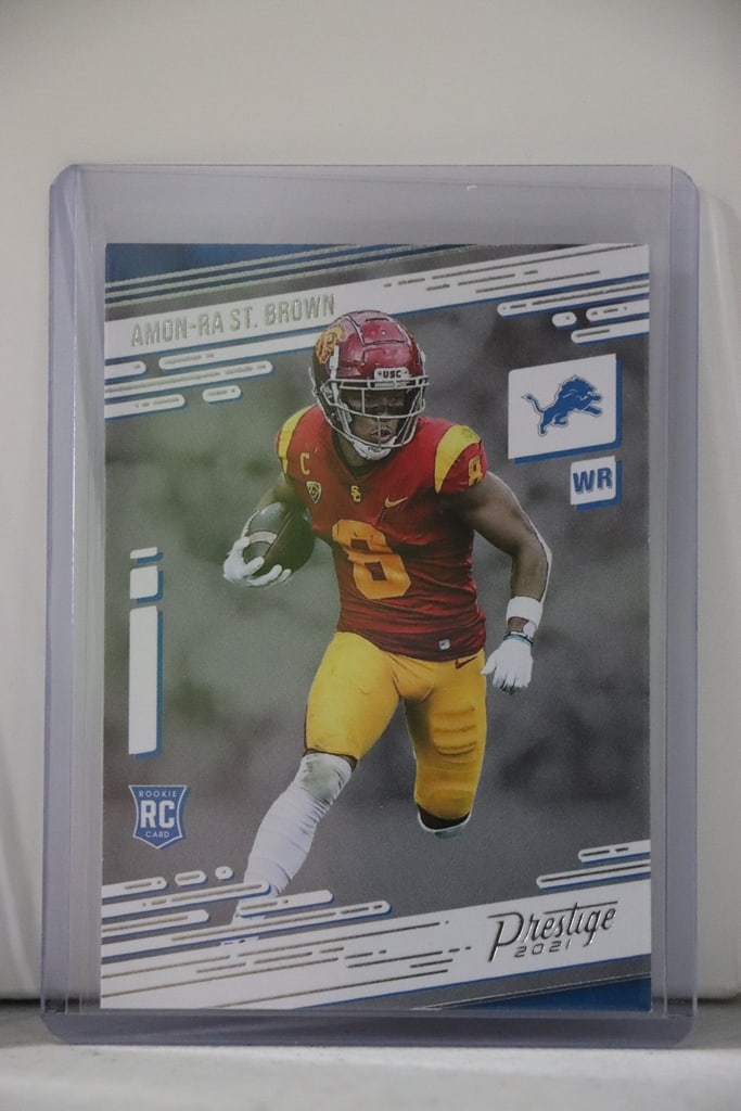 AMON-RA ST. BROWN 2021 PANINI PRESTIGE ROOKIE CARD: NEAR MINT OR BETTER CONDITION 