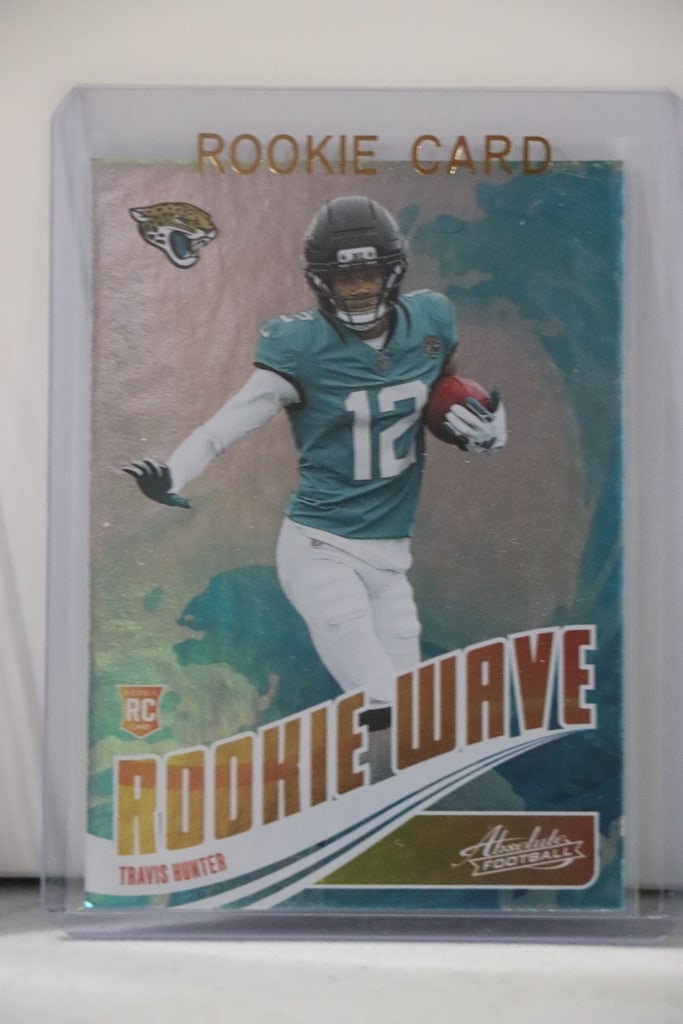 TRAVIS HUNTER 2025 PANINI ABSOLUTE ROOKIE WAVE ROOKIE CARD: NEAR MINT OR BETTER CONDITION