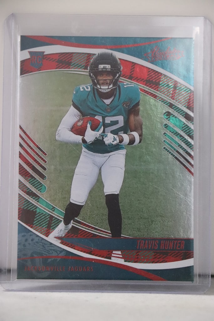 TRAVIS HUNTER 2025 PANINI ABSOLUTE HOLIDAY ROOKIE CARD: NEAR MINT OR BETTER CONDITION 