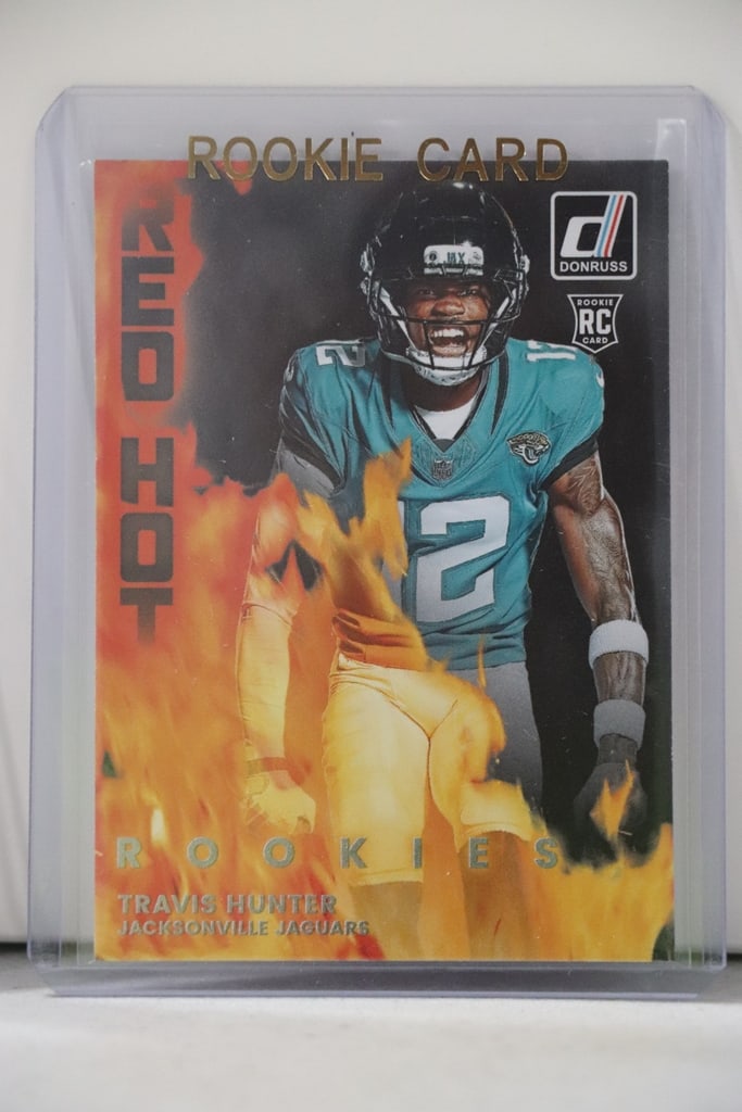 TRAVIS HUNTER 2025 DONRUSS RED HOT ROOKIE CARD: NEAR MINT OR BETTER CONDITION 