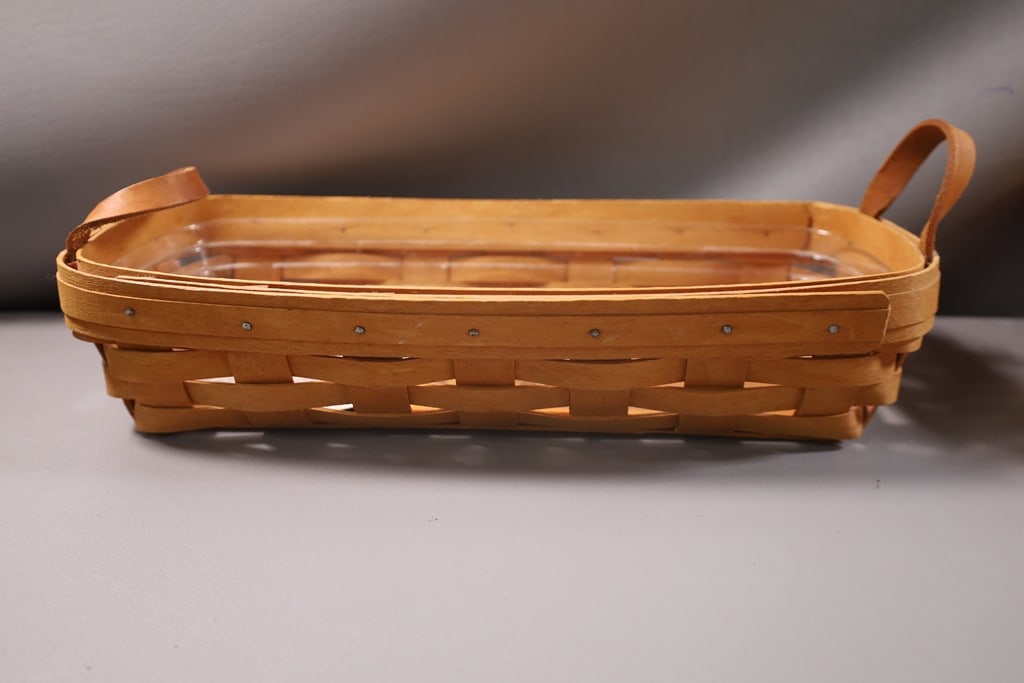 LONGABERGER: A RECTANGLE LONGABERGER BASKET WITH HANDLES. VERY GOOD CONDITION. 