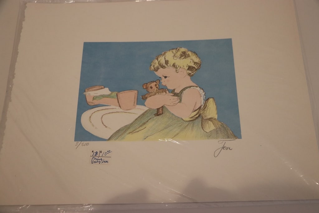 SIGNED LITHOGRAPH: A SIGNED LITHOGRAPH OF A YOUNG GIRL HOLDING A TEDDY. SIGNED JON AND NUMBERED 8/300. 10X13. VERY GOOD CONDITION. 