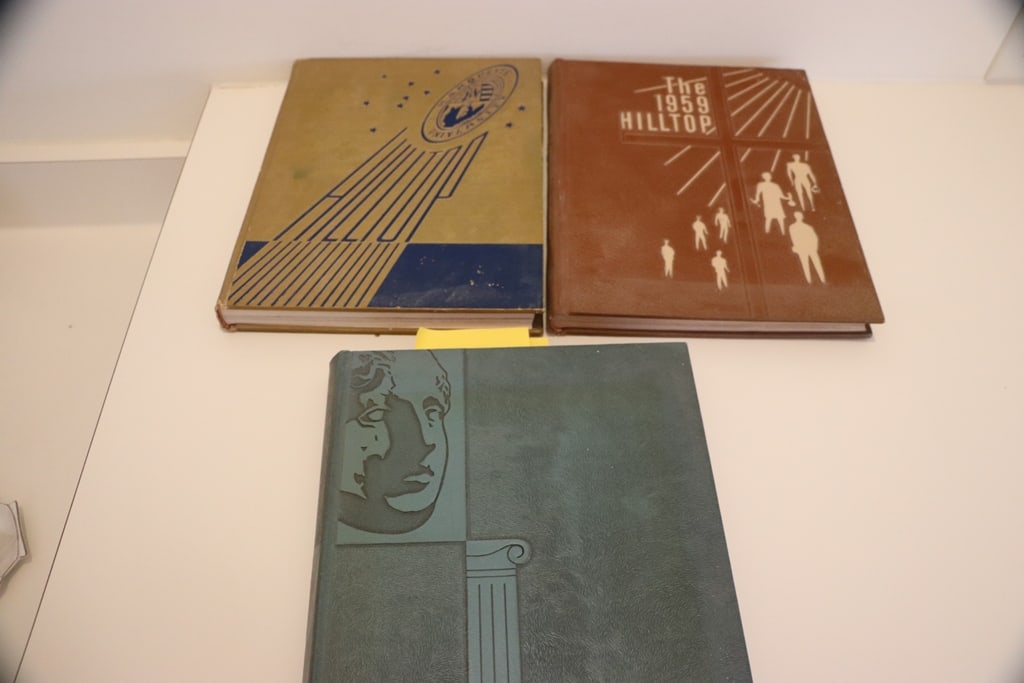 MARQUETTE UNIVERSITY YEARBOOKS: A GROUP OF 3 YEARBOOKS FROM MARQUETTE UNIVERISTY. ONE HAS A PHOTO OF WILT CHAMBERLAIN AND ALSO BOB HARLAN THE FORMER EXECUTIVE OF THE PACKERS. GOOD CONDITION. 