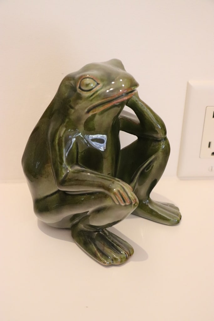 SIGNED CERAMIC FROG: A SIGNED CERAMIC THINKING FROG FIGURE. 7.5" VERY GOOD CONDITION.