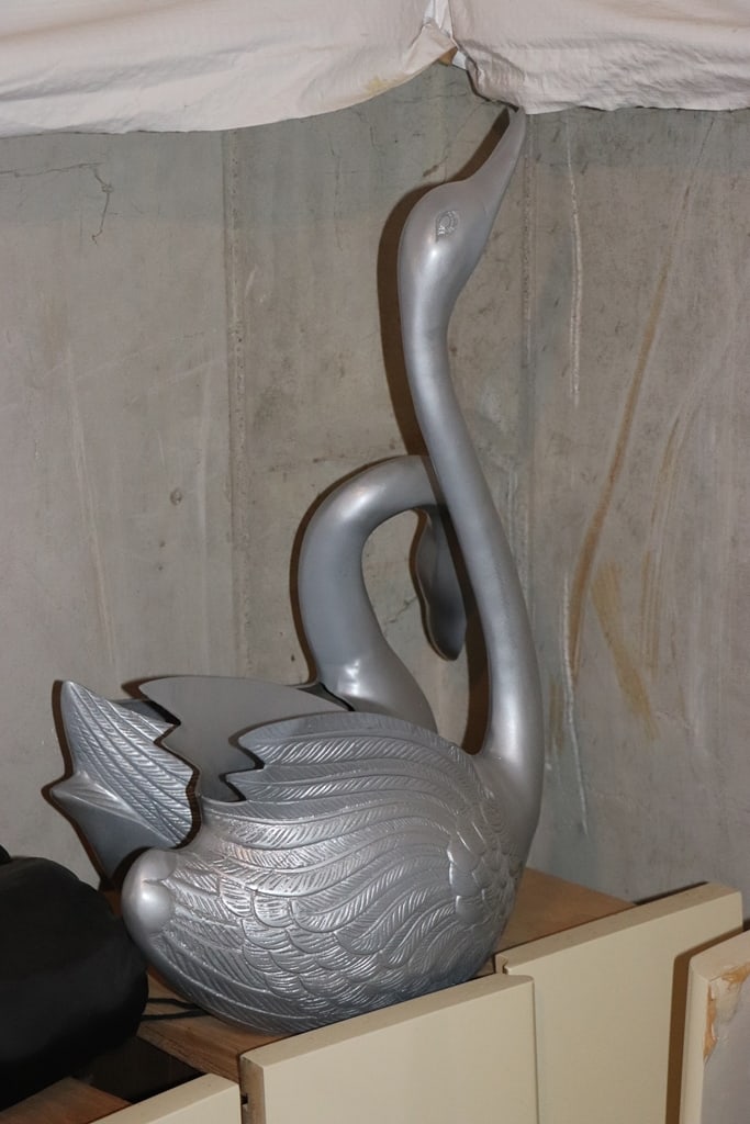 PLANTERS: A PAIR OF LIKE NEW METAL SWAN PLANTERS. 
