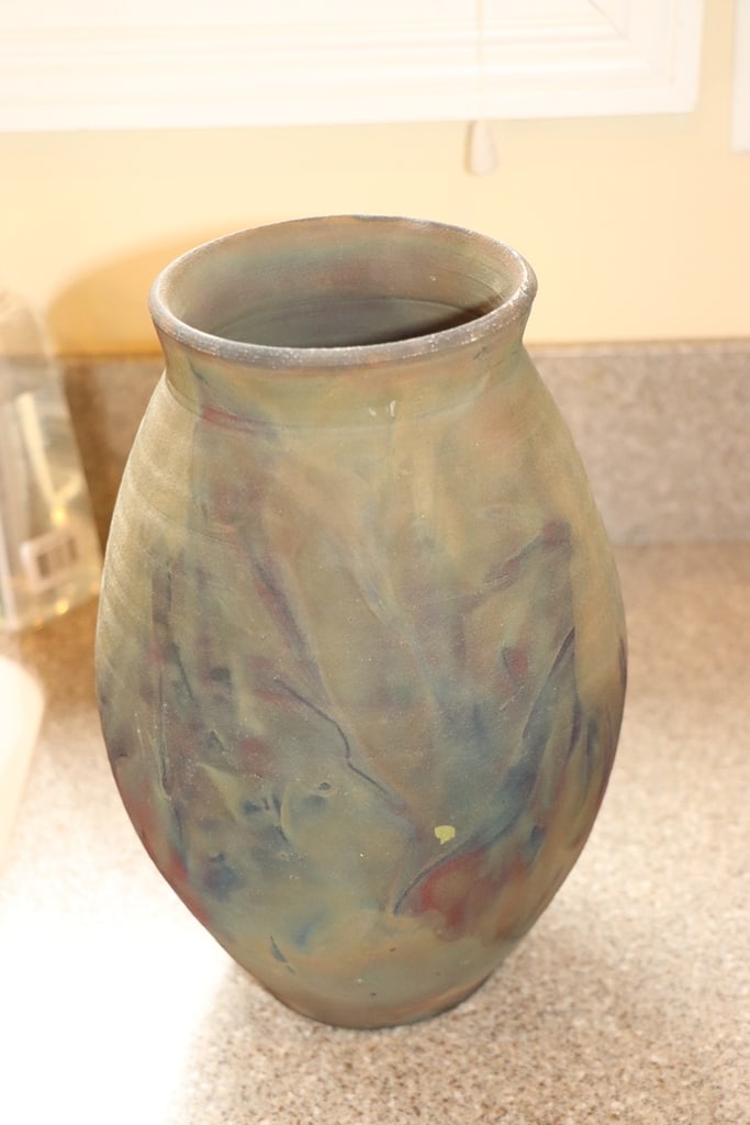 SIGNED VASE: A SIGNED MULTI-COLORED VASE. VERY GOOD CONDITION. 10" 