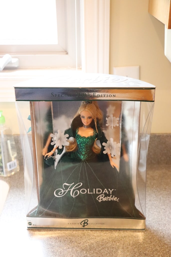 BARBIE DOLL: A 2004 HOLIDAY BARBIE. BRAND NEW BUT BOX MAY HAVE SOME CONDITION ISSUES. 