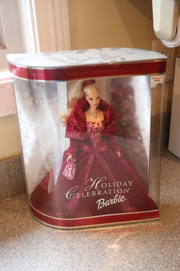 BARBIE DOLL: A 2002 HOLIDAY CELEBRATION BARBIE. BRAND NEW BUT BOX MAY HAVE SOME CONDITION ISSUES. 