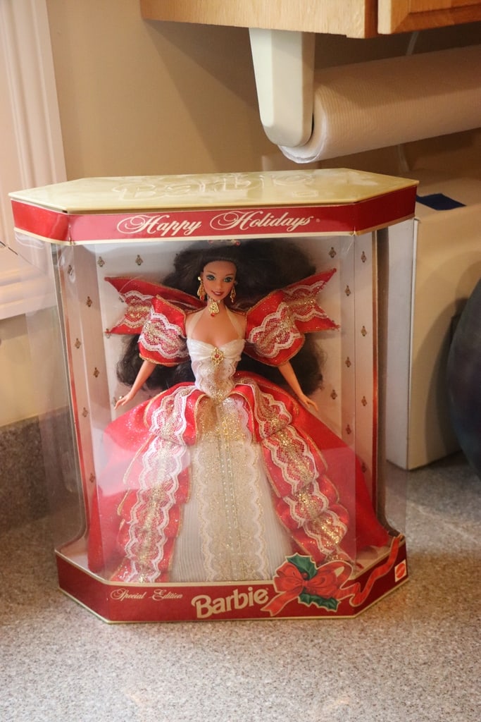 BARBIE DOLL: A 1997 HOLIDAY BARBIE. BRAND NEW BUT BOX MAY HAVE SOME CONDITION ISSUES. 
