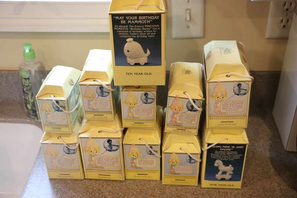 PRECIOUS MOMENTS: A SET OF PRECIOUS MOMENTS BIRTH THROUGH 10 BIRTHDAY TRAIN SET. VERY GOOD CONDITION. 