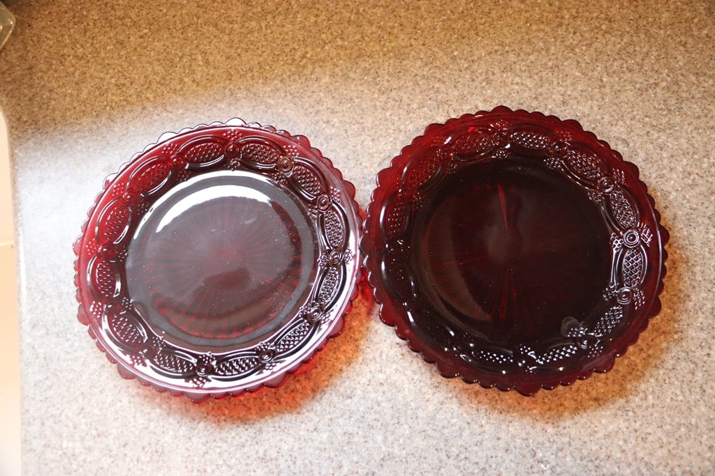 RUBY PLATES: A PAIR OF RUBY RED GLASS PLATES. VERY GOOD CONDITION. 8" 