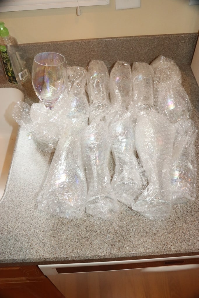 PEARLESCENT GLASSES: A SET OF 16 (8 WINE AND 8 CHAMPAGNE) PEARLESCENT GLASSES. LIKE NEW. 