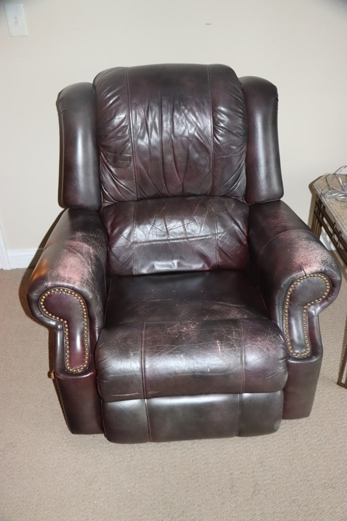 LEATHER RECLINER: A LA-Z-BOY LEATHER RECLINER. FUNCTION GREAT. LEATHER COULD USE SOME RECONDITIONING. 