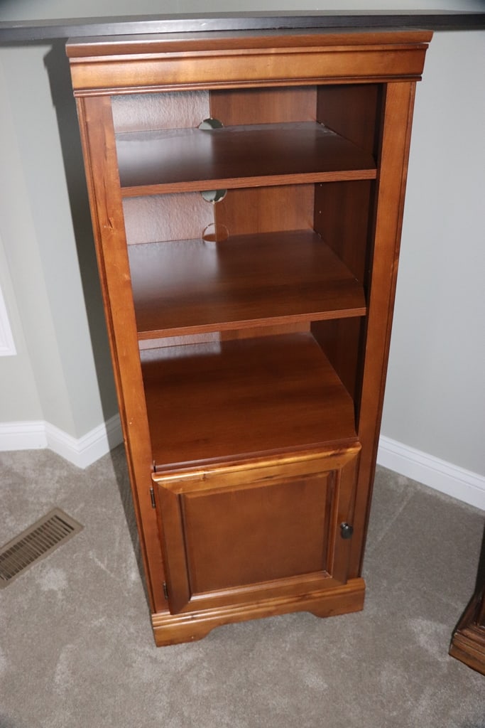 STORAGE SHELF: A WOOD STORAGE SHELF FOR AN OFFICE OR BEDROOM. WAS USED FOR A FLAT SCREEN TV AND CABLE BOX. VERY GOOD CONDITION. 65" T 
