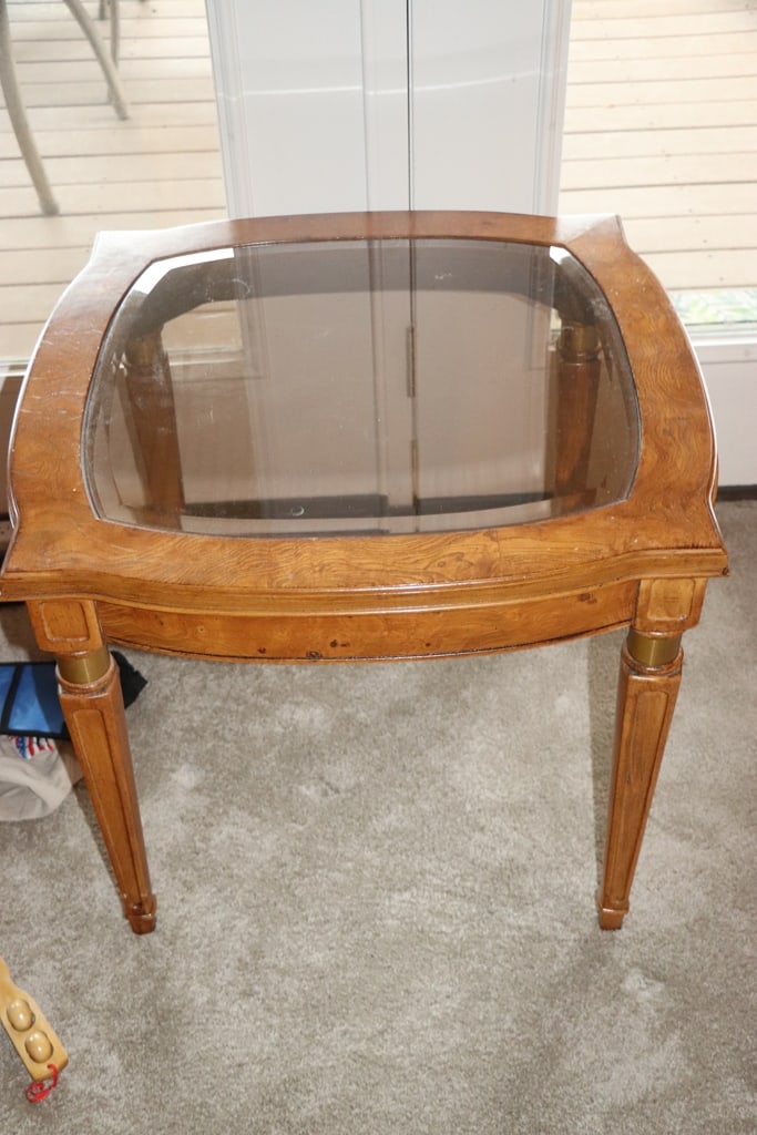 SIDE TABLE: A GLASS TOP SQUARE SIDE TABLE. VERY GOOD CONDITION. 26" X 30" 