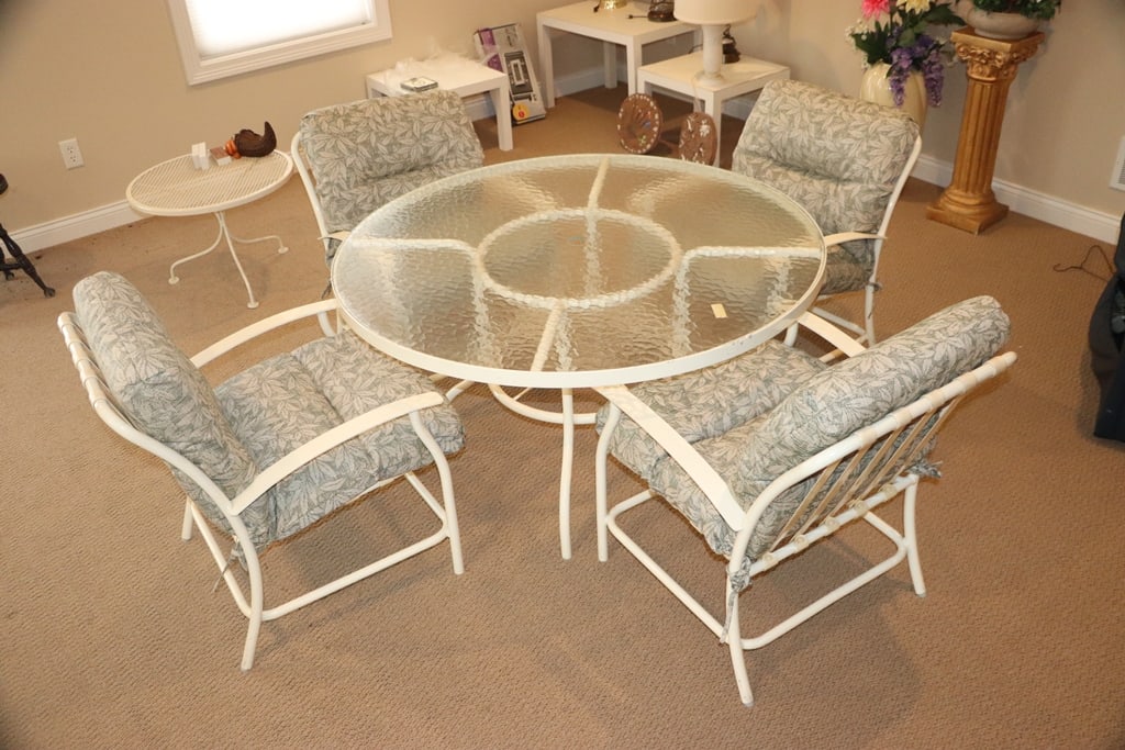 PATIO SET: A PATIO TABLE AND 4 CHAIRS. MOSTLY KEPT INDOORS. VERY GOOD CONDITION.