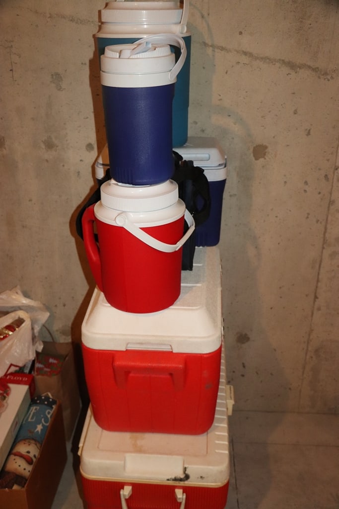 COOLERS: A GROUP OF VARIOUS SIZED COOLERS. VERY GOOD CONDITION. 