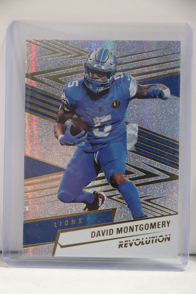 DAVID MONTGOMERY 2025 PANINI REVOLUTION NEUTRON FOIL SP: 24/30. NEAR MINT OR BETTER CONDITION 