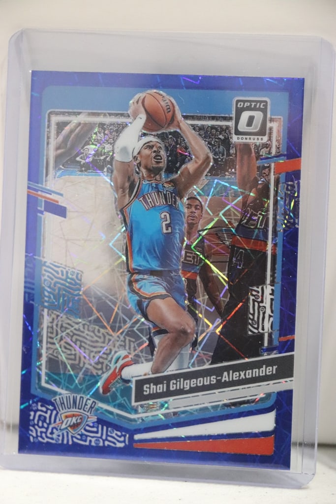 SHAI GILGEOUS ALEXANDER 2023-24 PANINI OPTIC BLUE LAZER PRIZM: NEAR MINT OR BETTER CONDITION 