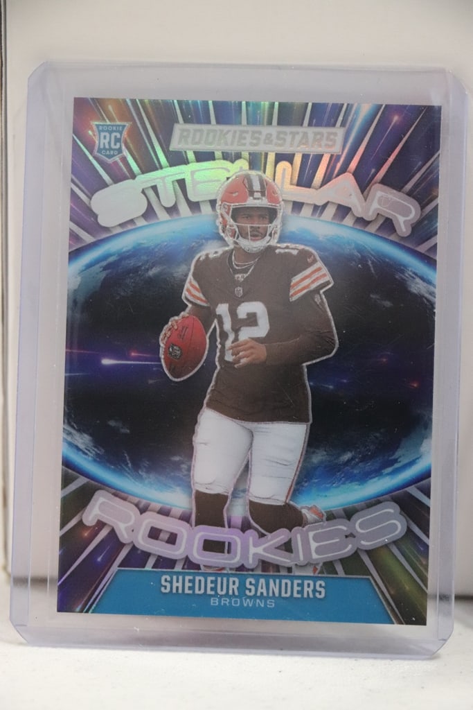 SHEDEUR SANDERS 2025 PANINI ROOKIES & STARS STELLAR SILVER PRIZM ROOKIE CARD: NEAR MINT OR BETTER CONDITION 