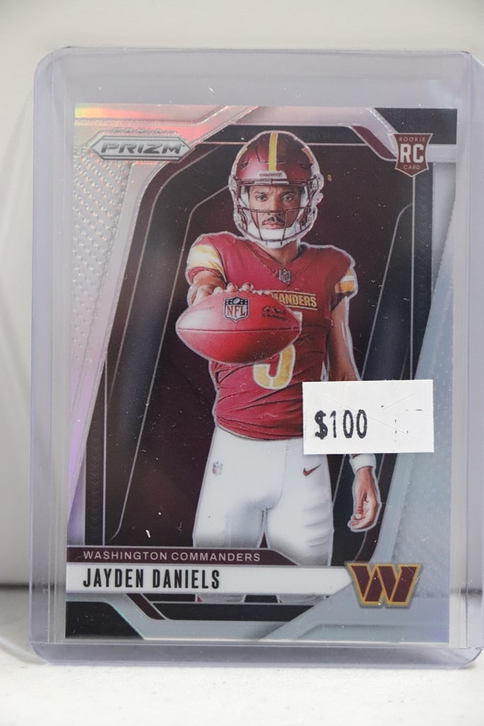 JAYDEN DANIELS 2024 PANINI PRIZM PHOTO VARIATION SP SILVER PRIZM ROOKIE CARD: NEAR MINT OR BETTER CONDITION 