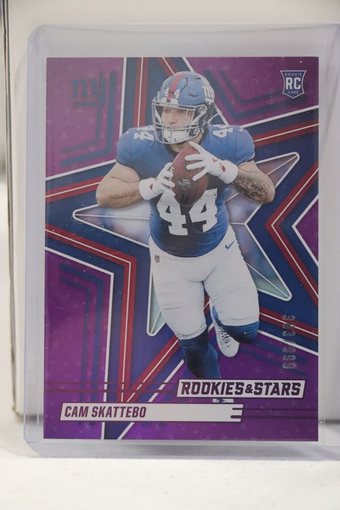 CAM SKATTEBO 2025 PANINI ROOKIES & STARS PURPLE FOIL ROOKIE CARD: 383/999. NEAR MINT OR BETTER CONDITION