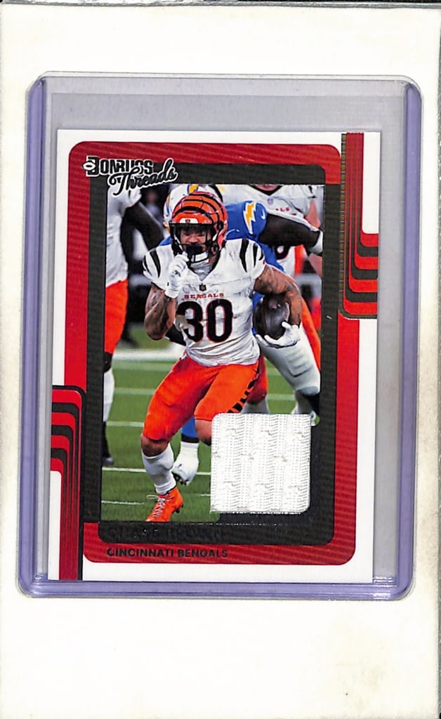 CHASE BROWN 2025 DONRUSS THREADS GAME USED WHITE JERSEY CARD: NEAR MINT OR BETTER CONDITION