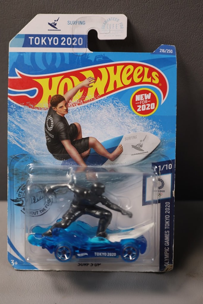 HOT WHEELS CAR: A HOT WHEELS 2020 SURFING TOKYO OLYMPICS CAR. NEW BUT BOX/PACKAGE MIGHT HAVE CONDITION ISSUES.