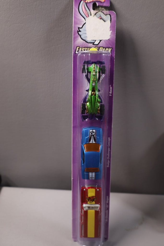 HOT WHEELS CAR: A HOT WHEELS EASTER PACK OF 3 CARS. NEW BUT BOX/PACKAGE MIGHT HAVE CONDITION ISSUES.