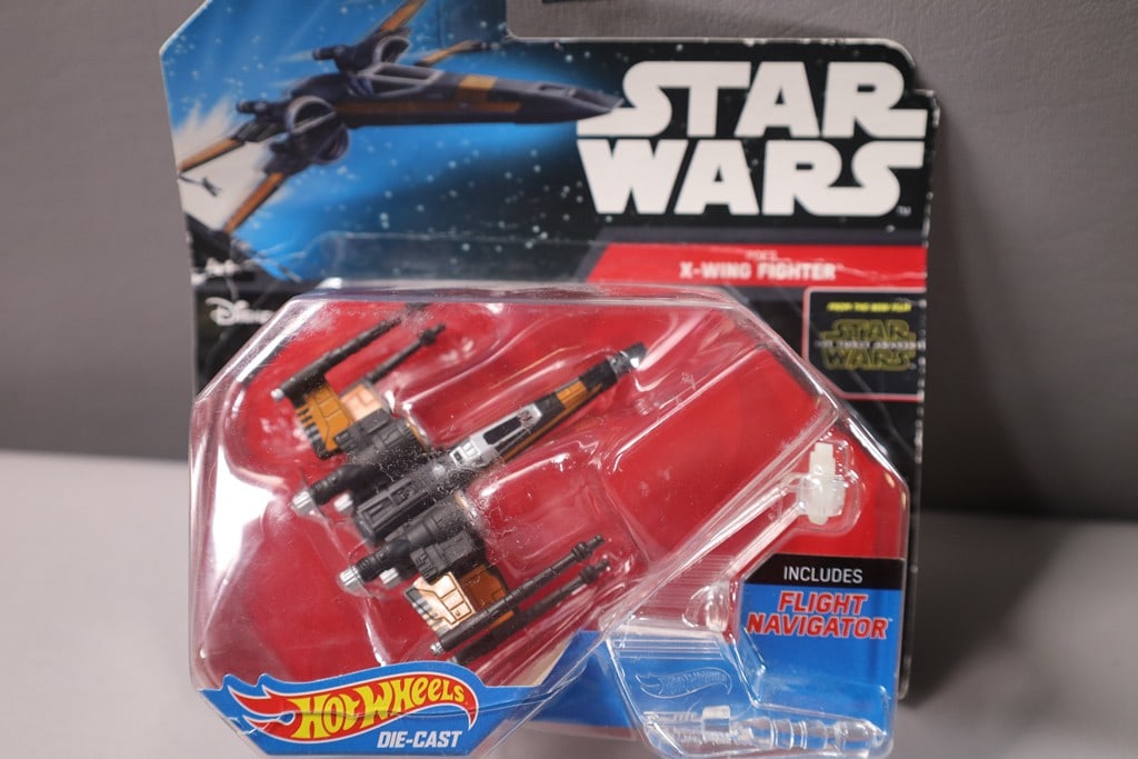 HOT WHEELS CAR: A HOT WHEELS STAR WARS POE'S X-WING. NEW BUT BOX/PACKAGE MIGHT HAVE CONDITION ISSUES.