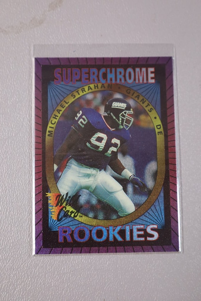 MICHAEL STRAHAN ROOKIE: A 1993 WILD CARD SUPERCHROME ROOKIE. NEAR MINT OR BETTER CONDITION.
