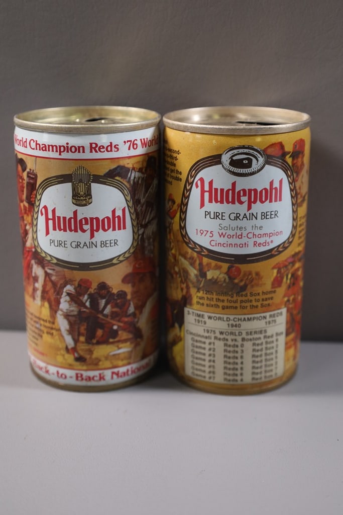 REDS BEER CANS: A PAIR OF 1975 AND 1976 CINCINNATI REDS HUDEPOHL BEER CANS. VERY GOOD CONDITION.