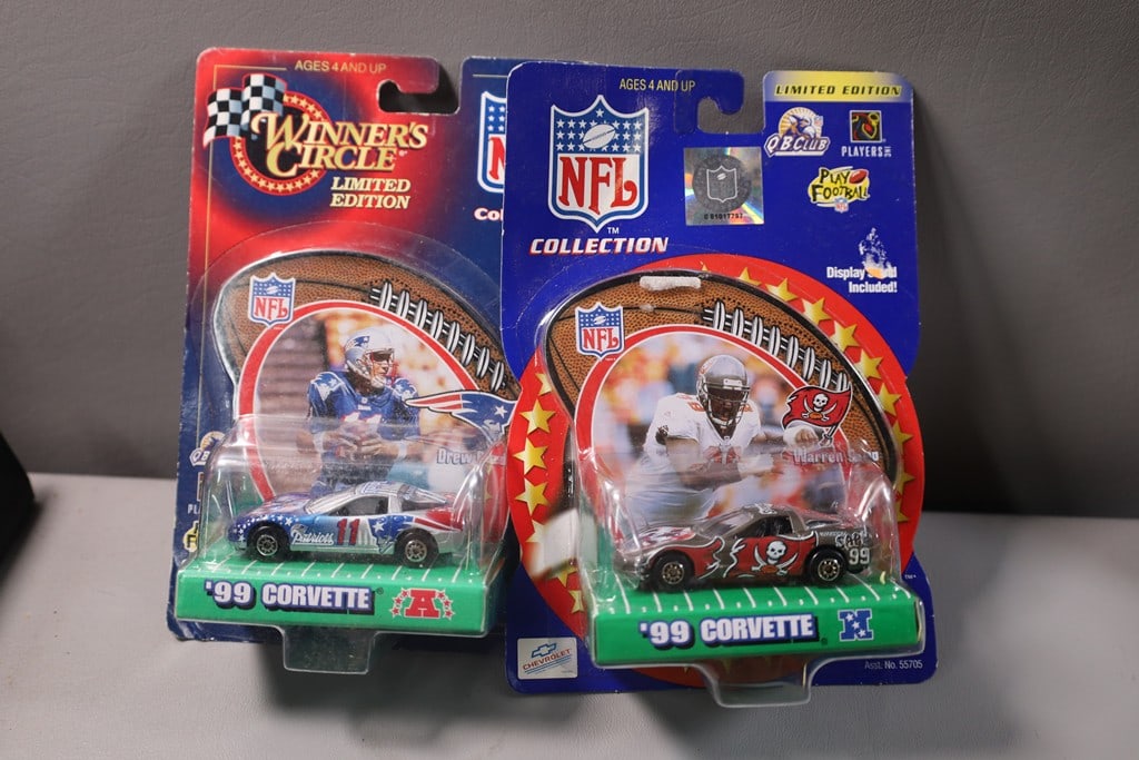 DIE CAST CAR: A WINNER'S CIRCLE WARRICK DUNN & DREW BLEDSOE DIE CAST CARD AND TRADING CARD.