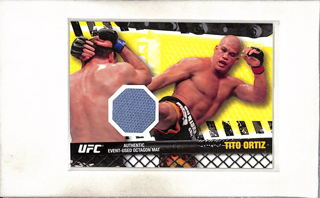 TITO ORTIZ 2010 TOPPS UFC FIGHT USED MAT RELIC FROM UFC 106: NEAR MINT OR BETTER CONDITION