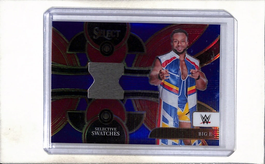 BIG E 2024 PANINI SELECT WWE BLUE PRIZM WORN USED SHIRT PATCH: 1/49. NEAR MINT OR BETTER CONDITION