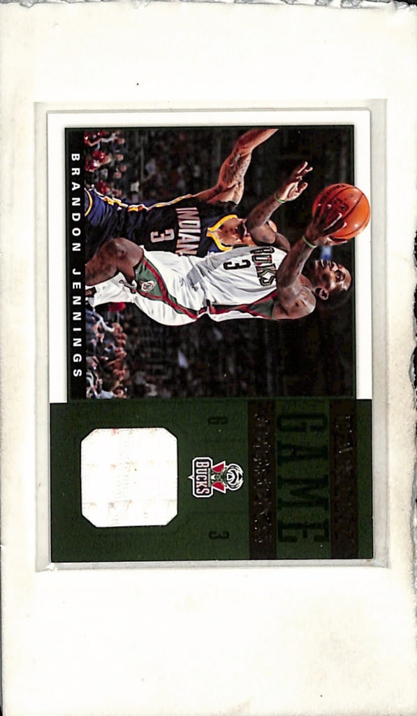 BRANDON JENNINGS 2012-13 PANINI GAME USED JERSEY CARD: NEAR MINT OR BETTER CONDITION