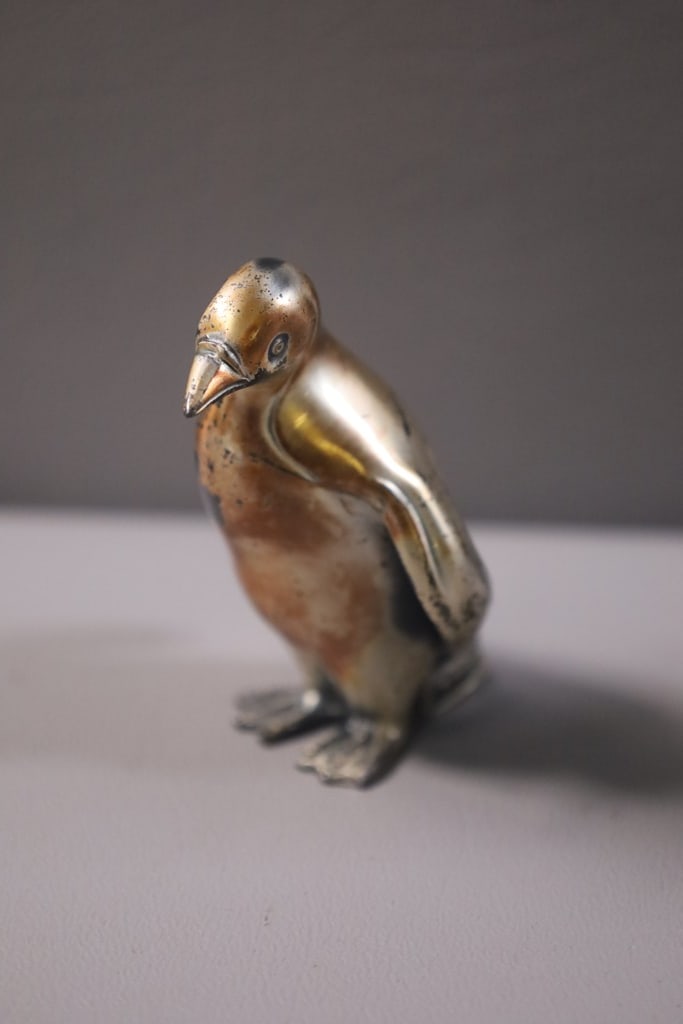 SILVERPLATE PENGUIN: A ROCKEFELLER CENTER SILVERPLATE PENGUIN FIGURE. VERY GOOD CONDITION. 3"