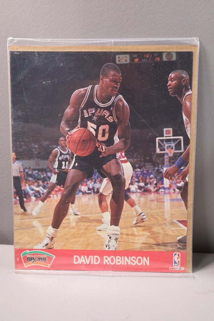 DAVID ROBINSON PHOTO: A SEALED 1990 HOOPS DAVID ROBINSON 8X10 PHOTO.