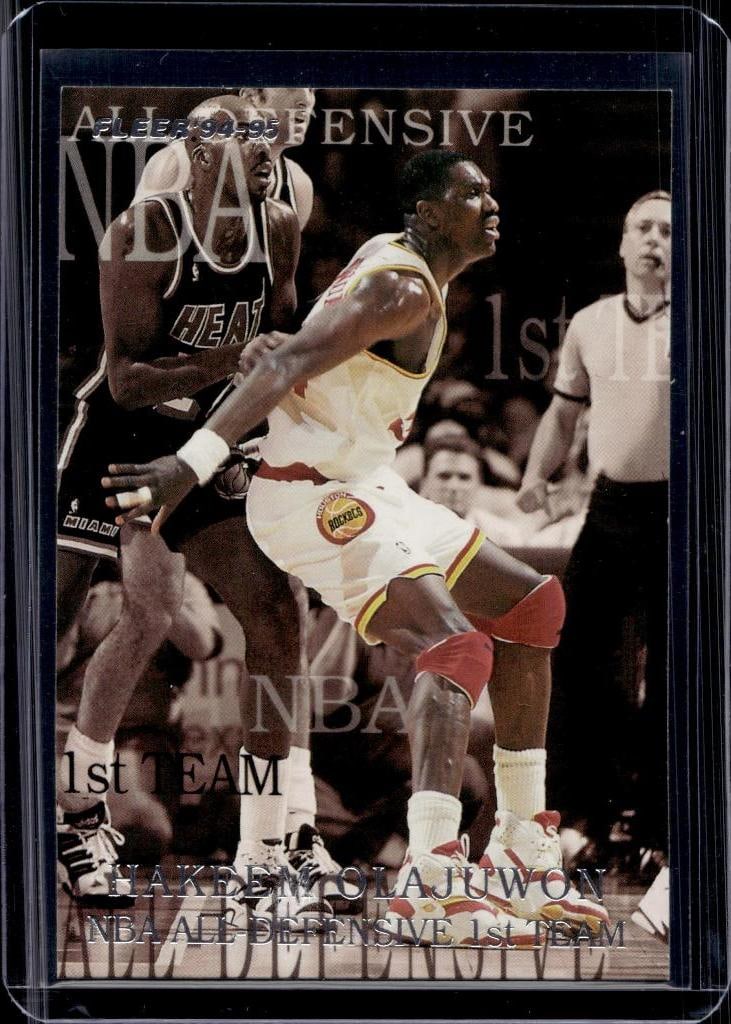 HAKEEM OLAJUWON 1994-95 FLEER NBA ALL-DEFENSIVE INSERT: NEAR MINT OR BETTER CONDITION