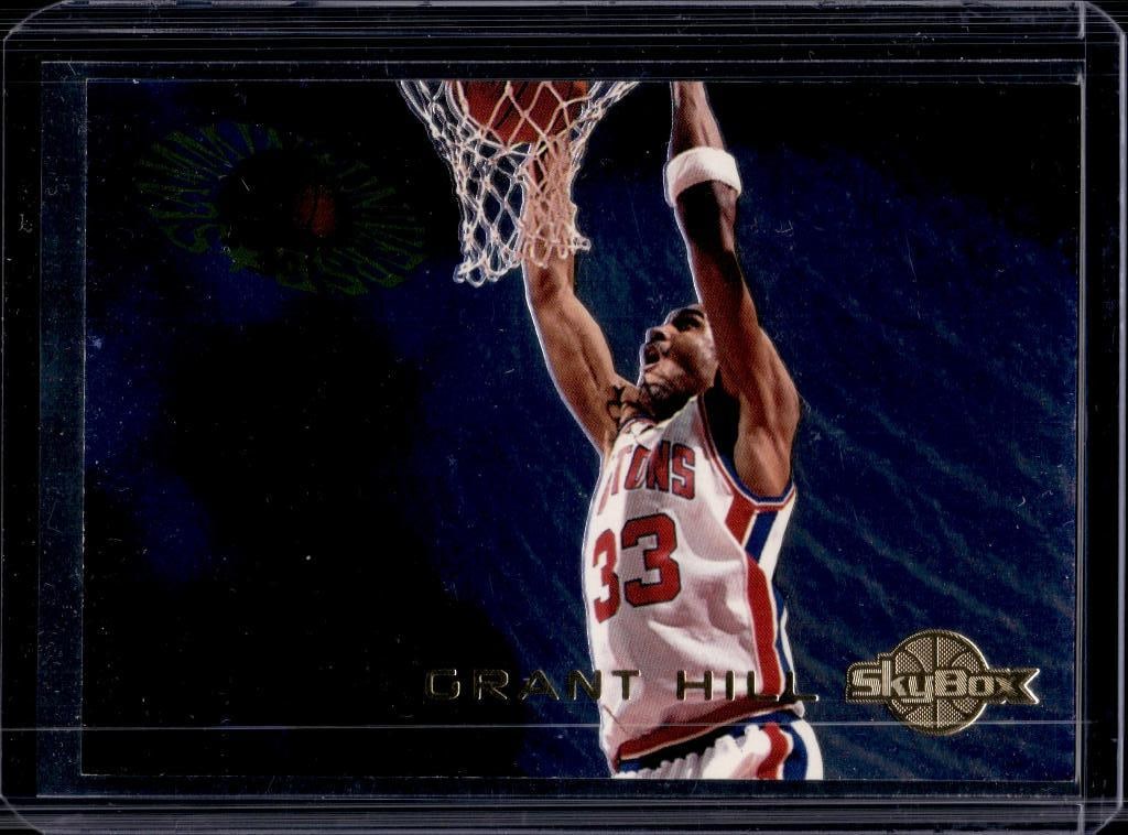 GRANT HILL 1994-95 SKYBOX PREMIUM SLAMMIN UNIVERSE INSERT: NEAR MINT OR BETTER CONDITION