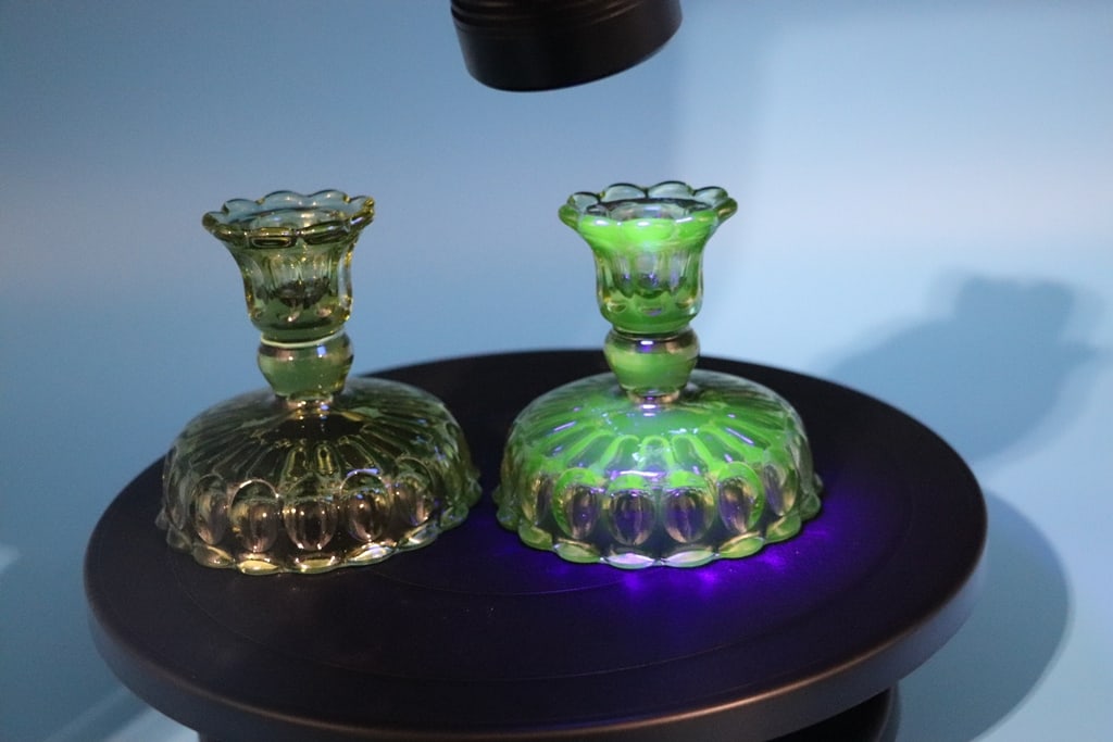URANIUM GLASS: A PAIR OF VINTAGE URANIUM GLASS CANDLE HOLDERS. VERY GOOD CONDITION. 5"