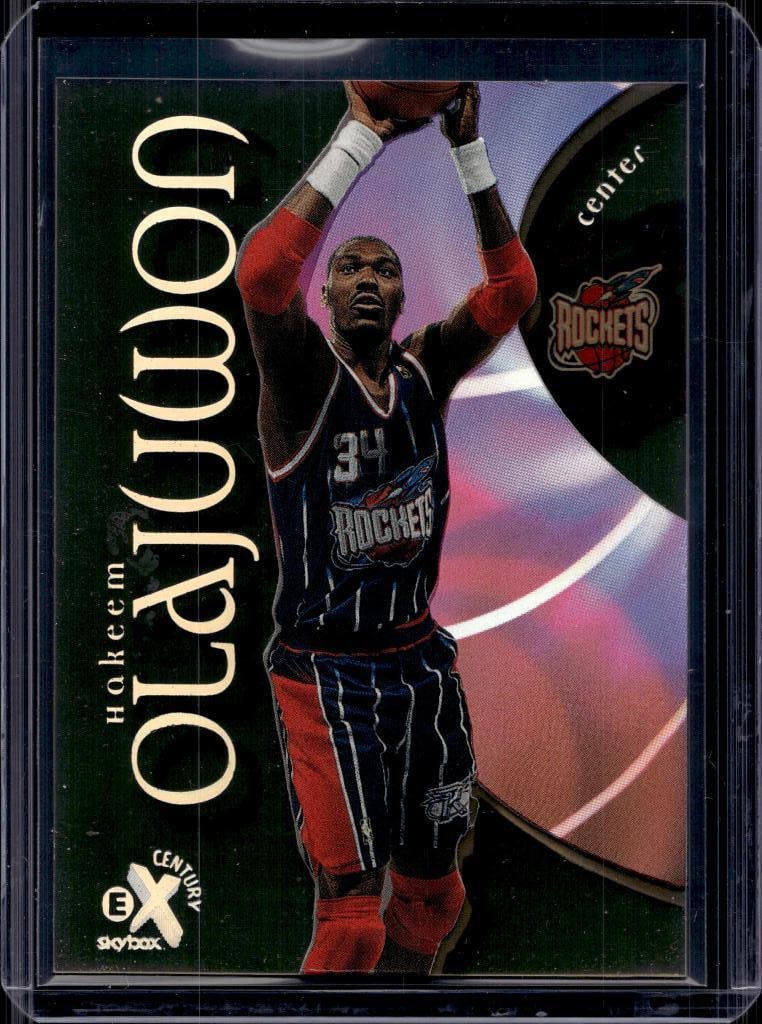 HAKEEM OLAJUWON 1998-99 SKYBOX EX-CENTURY: NEAR MINT OR BETTER CONDITION
