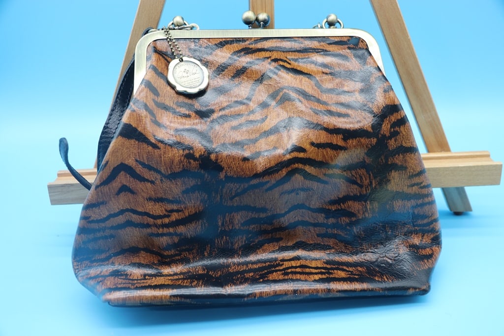 PATRICIA NASH PURSE: A PATRICIA NASH 10TH ANNIVERSARY ANIMAL PRINT PURSE. LIKE NEW