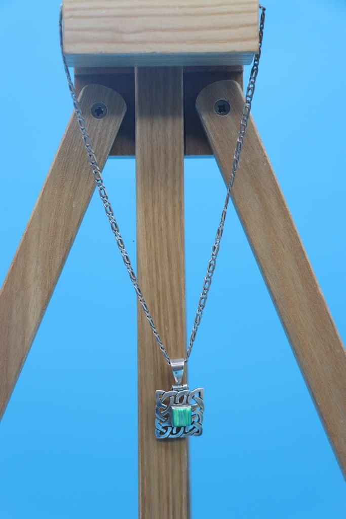 STERLING NECKLACE: A STERLING SILVER NECKLACE WITH A .950 CHARM. VERY GOOD CONDITION