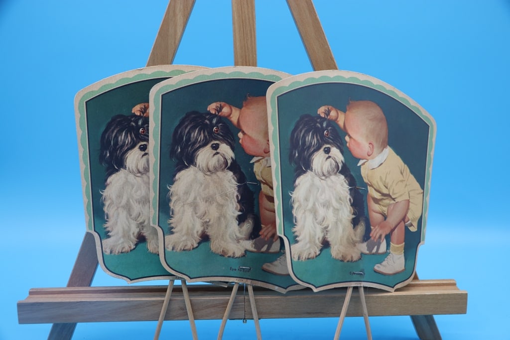 VINTAGE HAND FAN: A GROUP OF 3 VINTAGE LITHO HAND FANS WITH A BABY AND DOG. VERY GOOD CONDITION