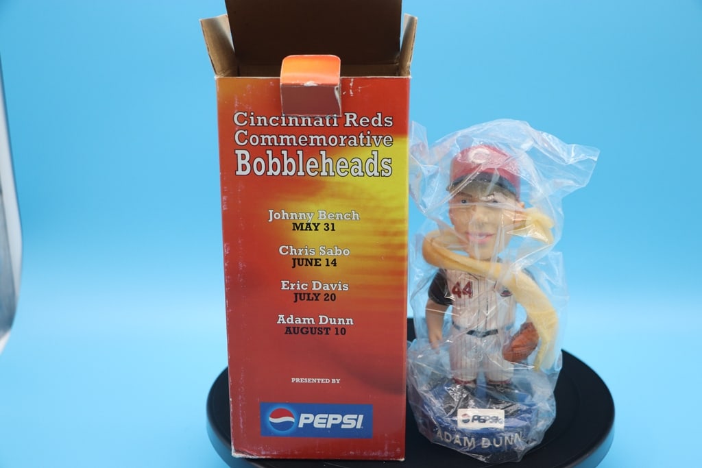 ADAM DUNN BOBBLE: A CINCINNATI REDS ADAM DUNN SGA 1ST YEAR BOBBLEHEAD. VERY GOOD CONDITION.