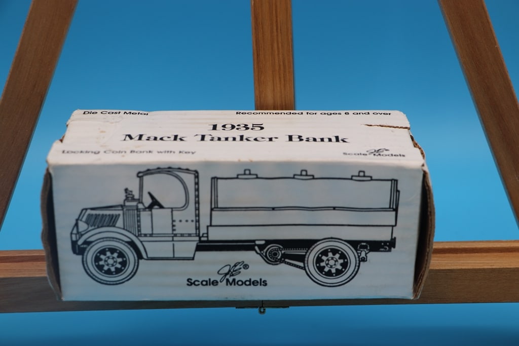 TEXACO ERTL DIE CAST: A TEXACO 1935 MACK TRUCK TANKER DIE CAST METAL COIN BANK. BOX MAY HAVE CONDITION ISSUES BUT THE ITEM IS EXCELLENT.