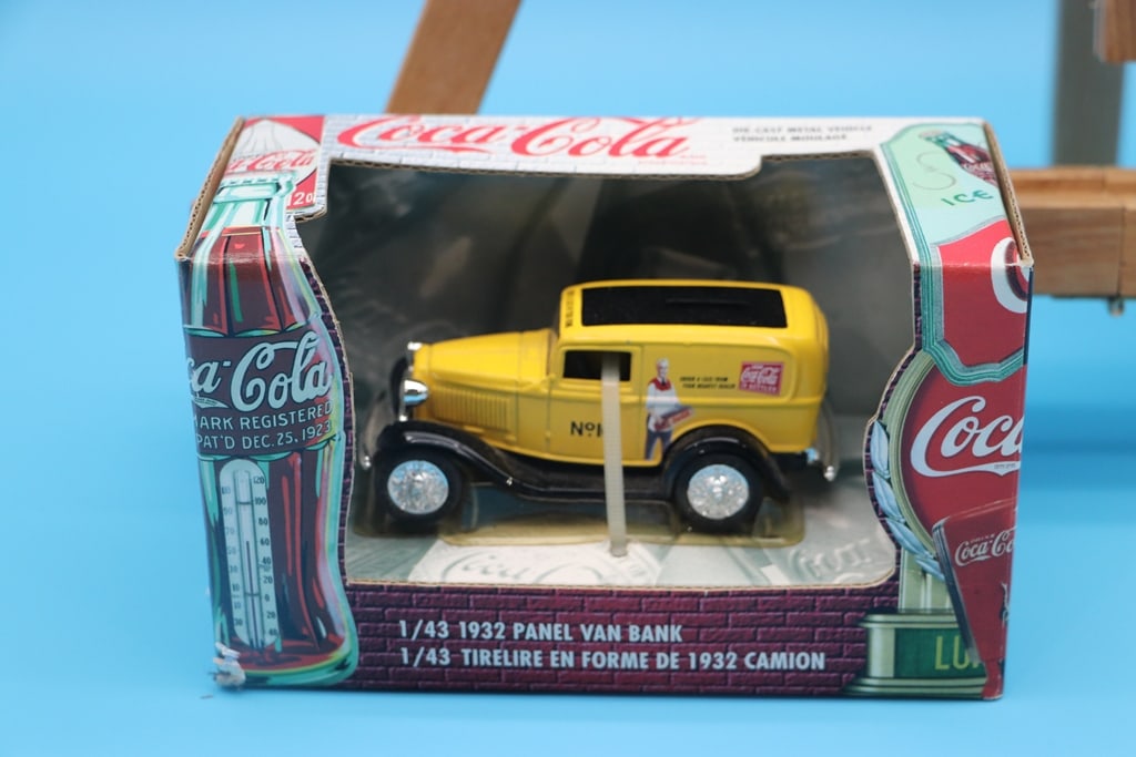 COCA COLA TRUCK: A 1/43 1932 COCA COLA YELLOW FORD PANEL VAN COIN BANK DIE CAST TRUCK. BRAND NEW