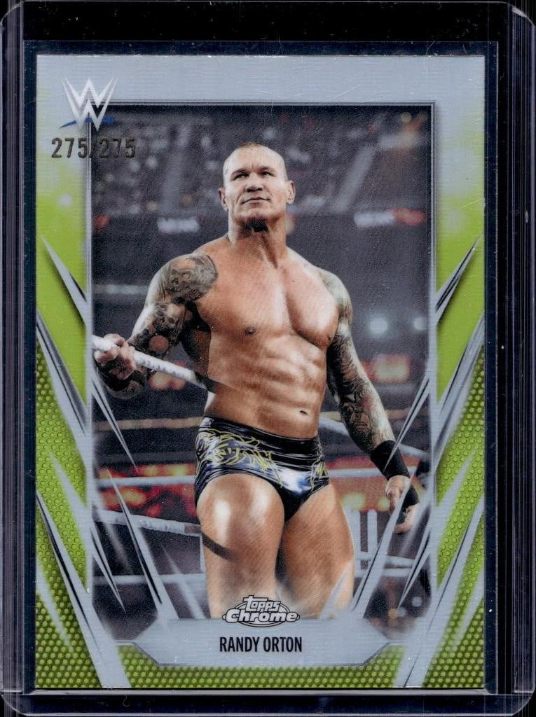 BRET THE HITMAN HART 2025 TOPPS WWE UNIVERSE INTERNATIONAL IMPACT RED HOLO: 1/10. NEAR MINT OR BETTER CONDITION
