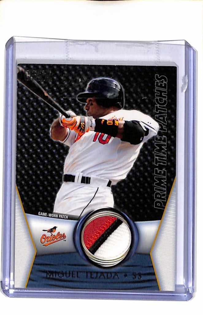 MIGUEL TEJADA 2009 TOPPS UNIQUE GAME USED JERSEY PATCH: 15/99. NEAR MINT OR BETTER CONDITION